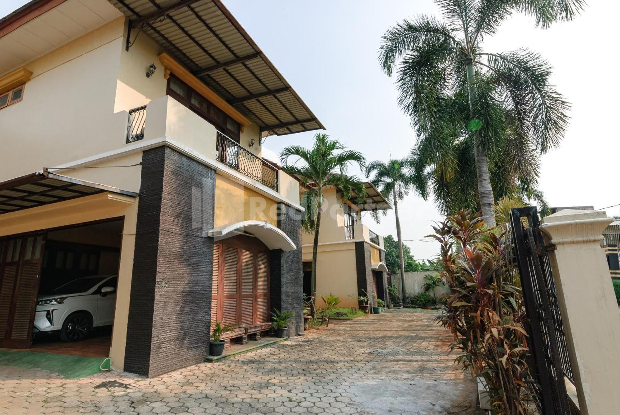Sr Residence Near Mall Ciputra Cibubur Mitra Reddoorz Бекасі Екстер'єр фото